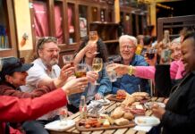 Why Cork Should Be Your Next Food-Filled Escape When it comes to planning a short break in Ireland, Cork has all the ingredients. Scenic drives, bustling markets, amazing meals, a chance to meet passionate producers and perhaps a few hidden treats discovered along the way. Whether it’s a spontaneous weekend away, a catch-up with friends or a family escape, Cork offers visitors the opportunity to slow down, explore and, most importantly, eat exceptionally well. It’s no secret that Cork has long been known as one of Ireland’s most exciting food regions. From the iconic 18th-century English Market in the heart of the city and the renowned gourmet town of Kinsale to its artisan cheesemakers, craft producers, and farmers who cultivate exceptional local ingredients across the region, food is deeply woven into the fabric of everyday life. Combined with a thriving restaurant scene and a rich culinary heritage, Cork’s reputation as Ireland’s food capital is well deserved. The county’s reputation has deep roots. For centuries, Cork has been synonymous with exceptional ingredients, with Cork Harbour serving as the main gateway for Irish food exports during the 18th and 19th centuries. Today, that legacy continues to thrive. Around 60% of Ireland’s artisan food producers are based in Cork, creating a vibrant food culture that champions local, seasonal and sustainable food. The county also boasts the highest concentration of Michelin-starred restaurants in Ireland, alongside independent cafés, historic pubs, local breweries and an ever-growing number of distilleries. That reputation continues to grow. Cork recently received another major culinary accolade when Cork on a Fork Fest (12-16 August) was named the No. 1 Summer Food Festival in Europe, further cementing the county’s position as one of the continent’s most exciting food destinations. The recognition reflects not only the quality of events over the week but Cork’s food offering in general – the passion of its producers, chefs, restaurateurs and food communities who continue to champion local food and unique culinary experiences. Now, Visit Cork’s new Experience Cork campaign is inviting visitors to discover the county through food and experience the people, places and flavours that have earned Cork its reputation. Through a collection of curated food trails, brewery and distillery tours, producer visits, culinary tours and hands-on food experiences, newly developed itineraries encourage visitors to delve deeper into the stories behind Cork’s thriving food scene. A Weekend Built Around Food One of Cork’s greatest strengths is that food experiences are never far away. Start the day wandering through the historic English Market, where traders greet regulars by name and visitors can browse everything from local cheeses and fresh seafood to traditional tripe and drisheen and artisan baked goods. Join a guided food tour like Cork Culinary Tours and you’ll uncover not only the flavours of Cork, but the stories and personalities that have shaped its food culture for generations. From the city, the food trail extends in every direction. Head south to Kinsale, where colourful streets are lined with cafés, restaurants and food producers. Join Kinsale Food Tours, sample local specialities and hear the stories behind one of Ireland’s best-loved food destinations. For something completely different, venture west to the Gaeltacht region of Mhuscraí, where O Tuama Tours offers visitors the opportunity to meet Italian Water Buffalo before sitting down to taste handcrafted cheeses produced on the family farm. It’s a uniquely Cork experience that combines food, farming and storytelling in equal measure. Meanwhile, artisan chocolatier and pastry cafe Praline provides a fascinating glimpse into the world of handcrafted chocolate, revealing the creativity and craftsmanship behind every piece. The Experience Cork campaign also highlights opportunities to explore local breweries and distilleries, meet producers at the source and enjoy hands-on culinary experiences that connect visitors directly with the ingredients, traditions and people that make Cork’s food scene so distinctive. *** What sets Cork apart isn’t just the quality of the food – it’s the people behind it. Across the county, producers, chefs, market traders and food entrepreneurs are eager to share their stories. Visitors are welcomed into farms, kitchens and workshops, offering a rare opportunity to see first-hand how local food is grown, crafted and celebrated. It’s this sense of connection that sits at the heart of the Experience Cork campaign. The initiative shines a spotlight on the makers, growers and guides who bring Cork’s food culture to life, giving visitors an opportunity to engage with the county in a more meaningful way. Of course, a trip to Cork is never just about the food. It’s about getting out on the water and into the landscape, and meeting the locals who are true characters. A morning food tour can be followed by a walk along the coast, a kayaking adventure, a visit to a picturesque harbour town or an afternoon exploring galleries, shops and local attractions. It’s one of the reasons Cork works so well as a short-break destination. Everything feels connected – the food, the landscape, the people and the sense of place. Because while Cork may be famous for its food, it’s the people, stories and experiences behind every bite that make it unforgettable. Visitors can explore newly curated itineraries and get inspiration for planning their own Cork food experience at purecork.ie/ExperienceCork, helping them build memorable short breaks centred on the people, food and adventures that define the county. #ExperienceCork